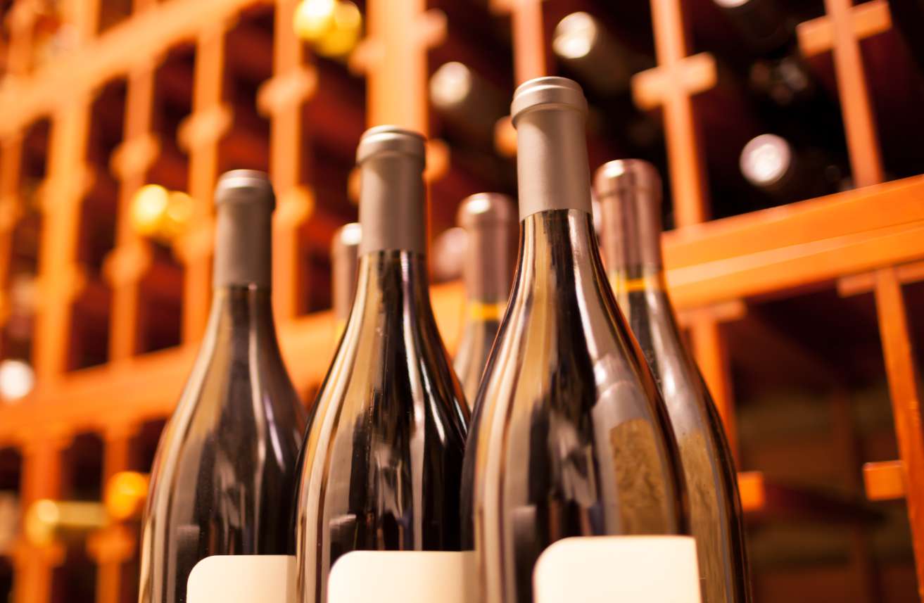 Stock,Of,Wine,Bottles,In,Cellar